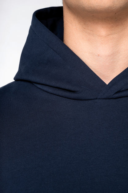 Unisex oversized organinės medvilnės džemperis su gobtuvu — naturalusdrabuziai.lt